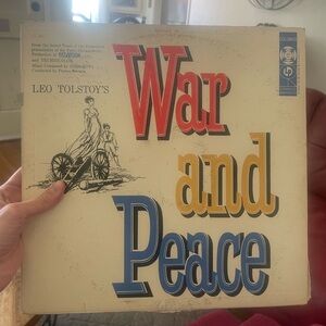 Columbia War and Peace Vinyl Record with Red, Blue, and Yellow Text